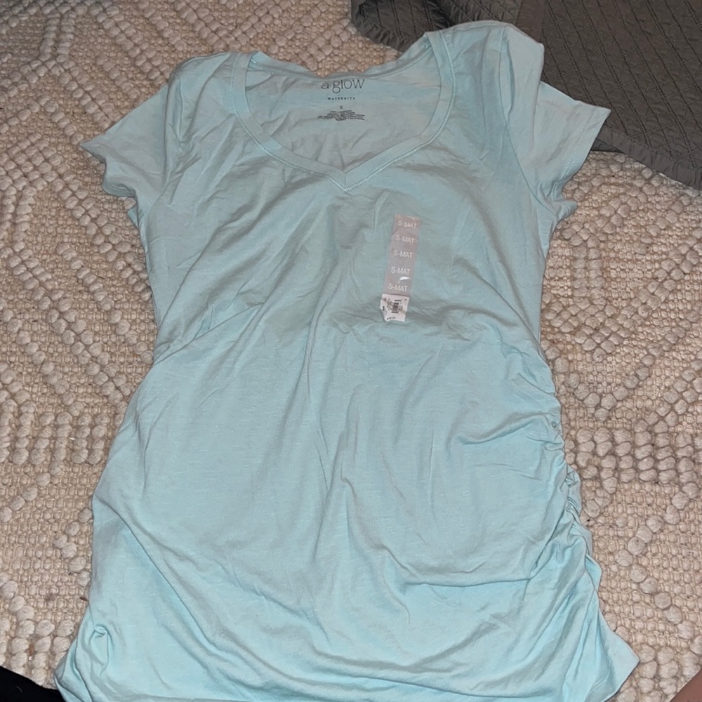 A glow maternity light blue/green shirt